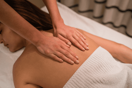 Back massage on the treatment table